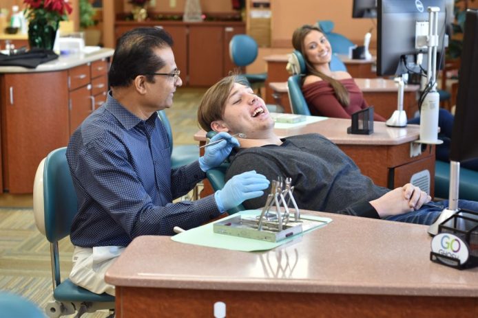 Dr. Ghosh with patient at Allentown office