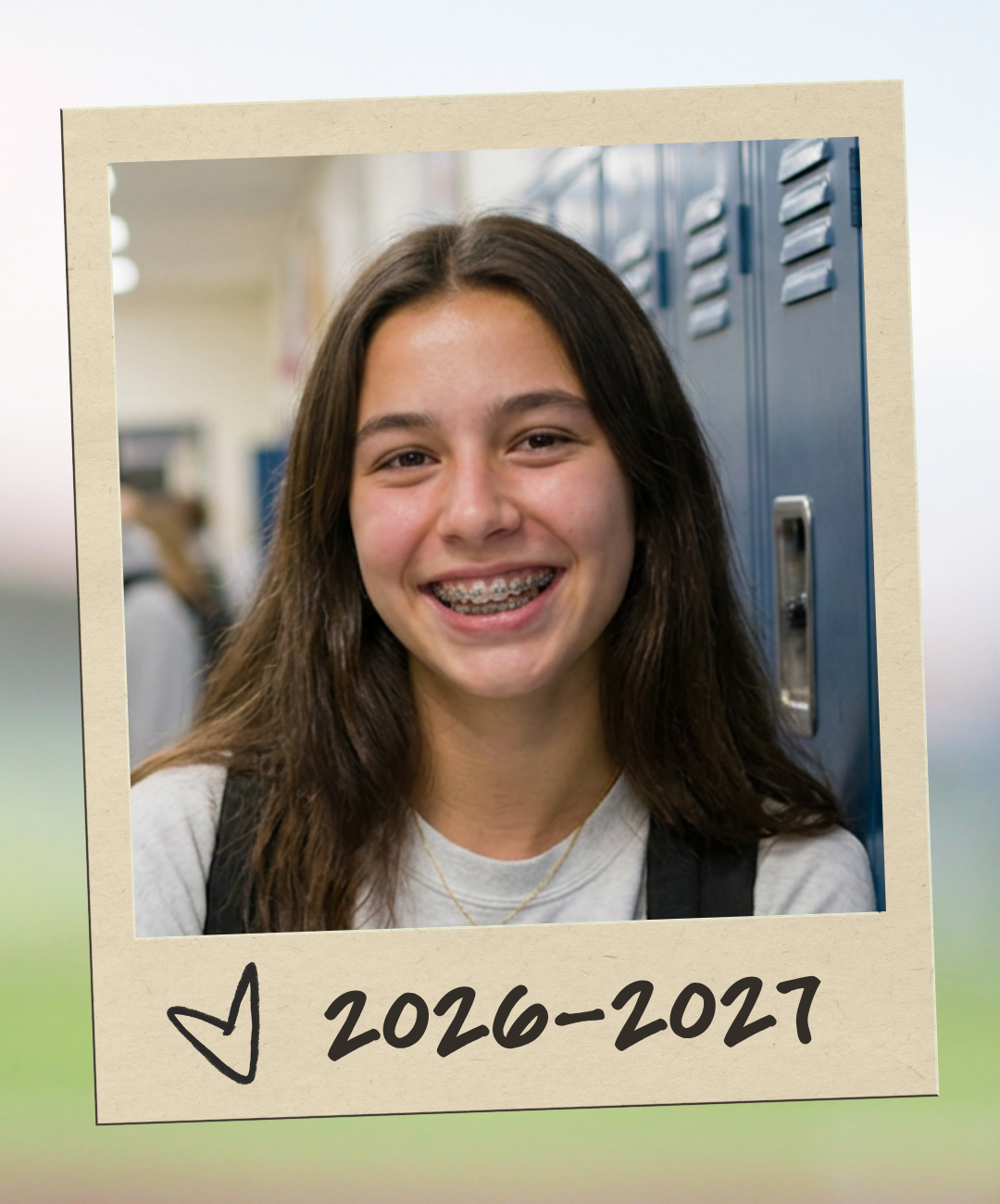 Teenage girl student with braces leaning against locker and smiling